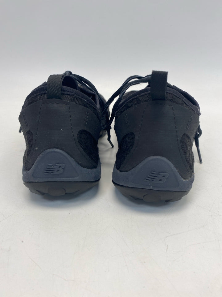 New Balance US Shoe Size 12 Black Lace-up Sneakers