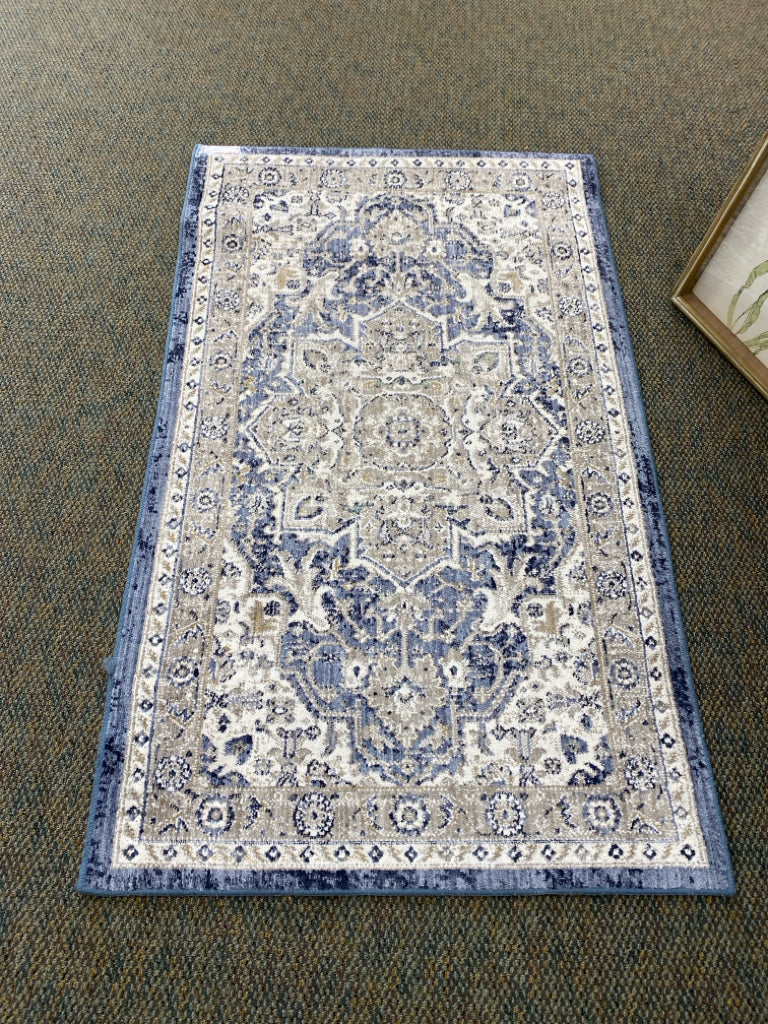 Blue/White Tan Print Rug