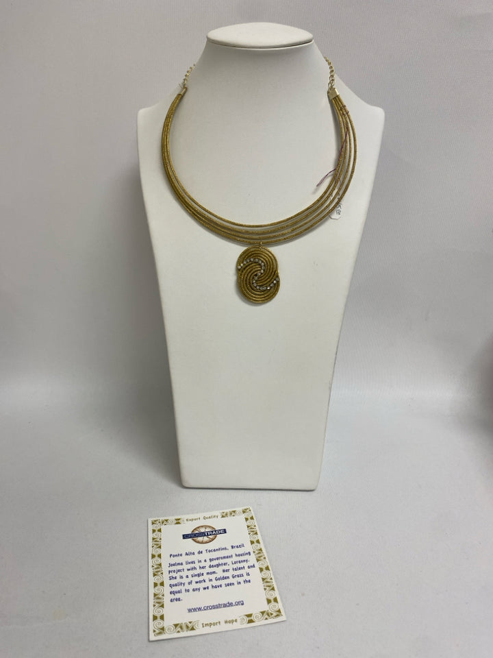 NWT Gold Color Clear Swirl Necklace