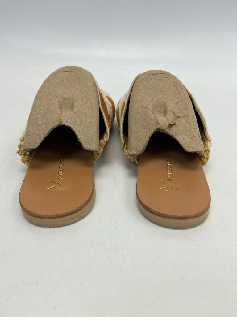 Anthropologie  Size 7 Brown/Cream Animal Print Cowhide Mules