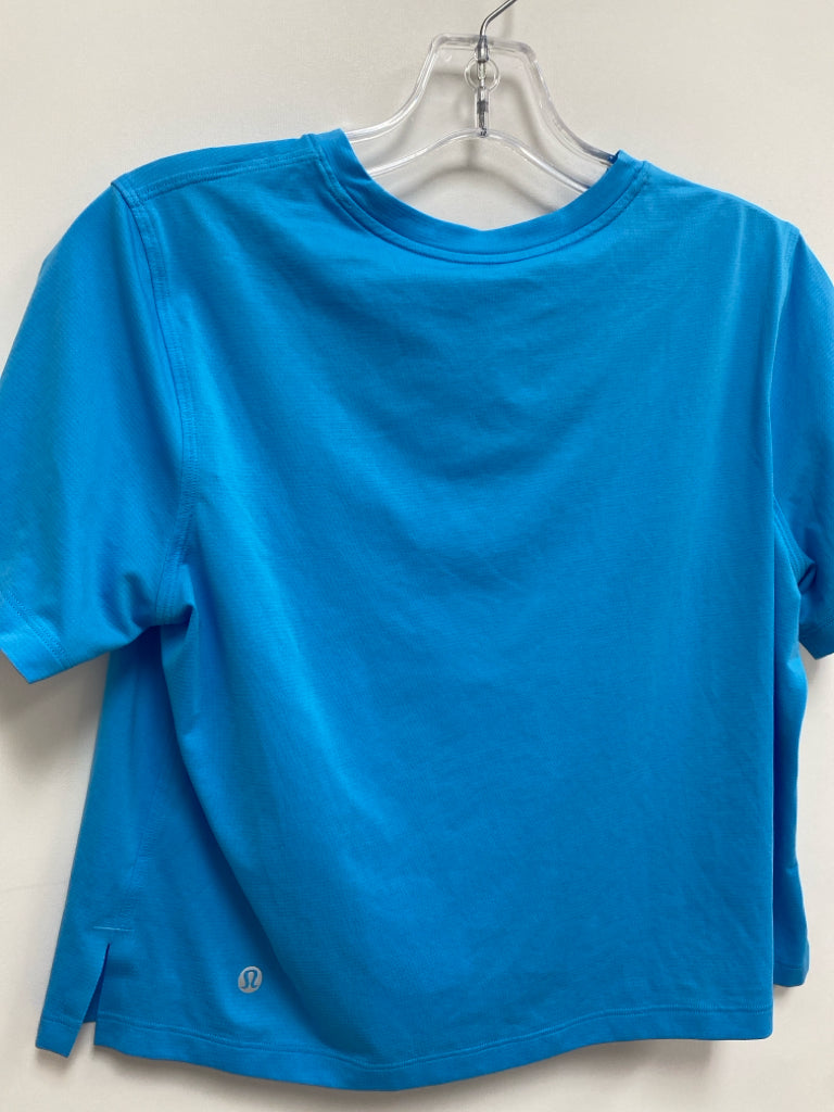 Lululemon Size 8 Turquoise Cropped Athletic Top