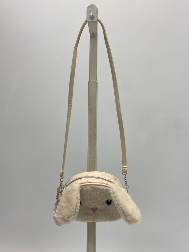 NWT Beige Pink Fuzzy Girl&