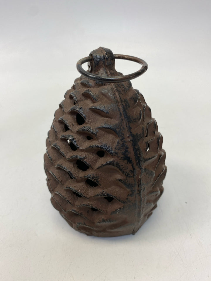 Brown Cast Iron Candleholder(s)
