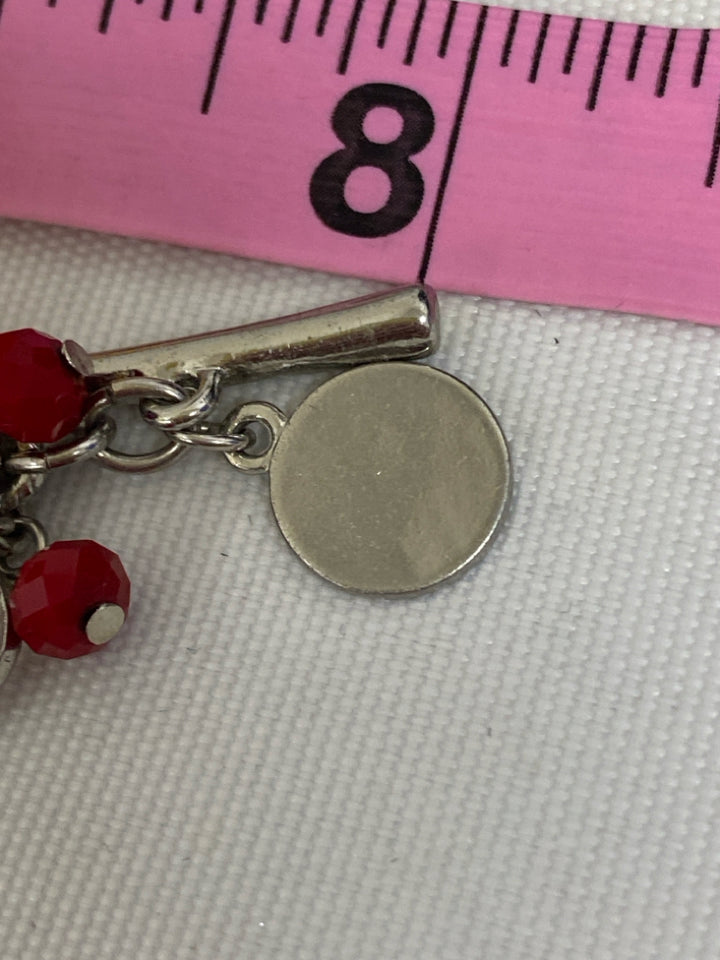 Wht House/Blk Mkt Silver Color Red Shapes Bracelet
