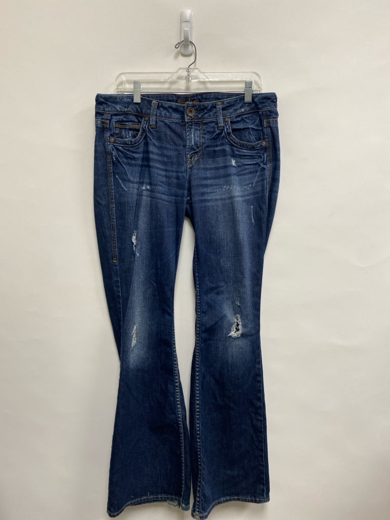 Silver Jeans Size 31 Faded Dark Blue Distressed Flared Ladies Jeans