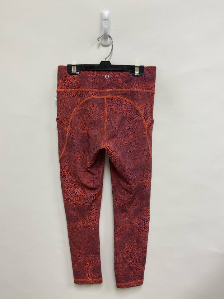 Lululemon Size 6 Orange/Navy Crackle Athletic Leggings